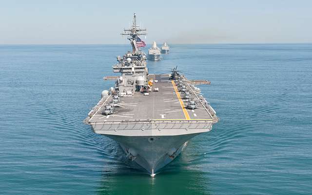 The amphibious assault ship USS Wasp and amphibious - NARA & DVIDS ...