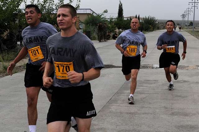 Deployed soldiers sprint to the finish line during - NARA & DVIDS ...