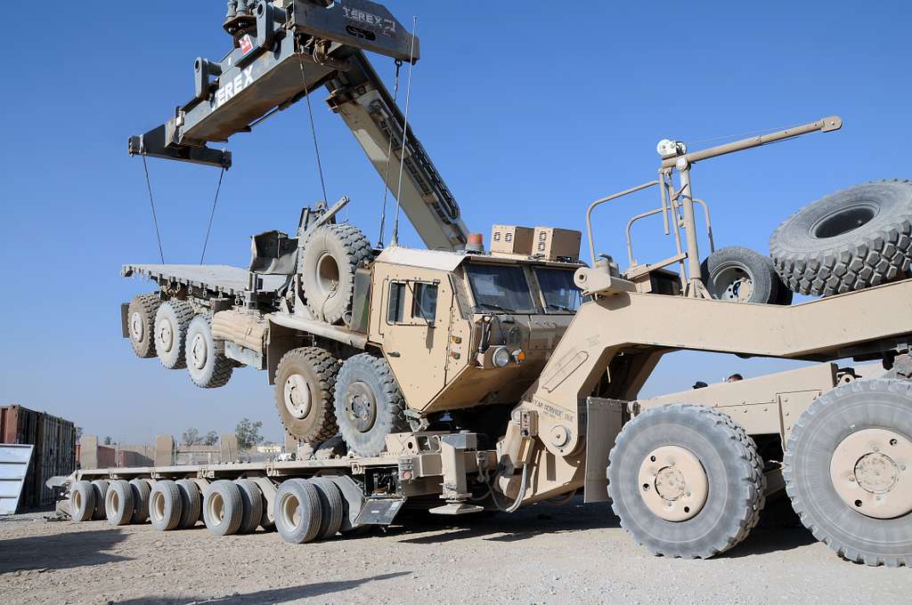 A Heavy Expanded Mobility Tactical Truck is being loaded - PICRYL ...