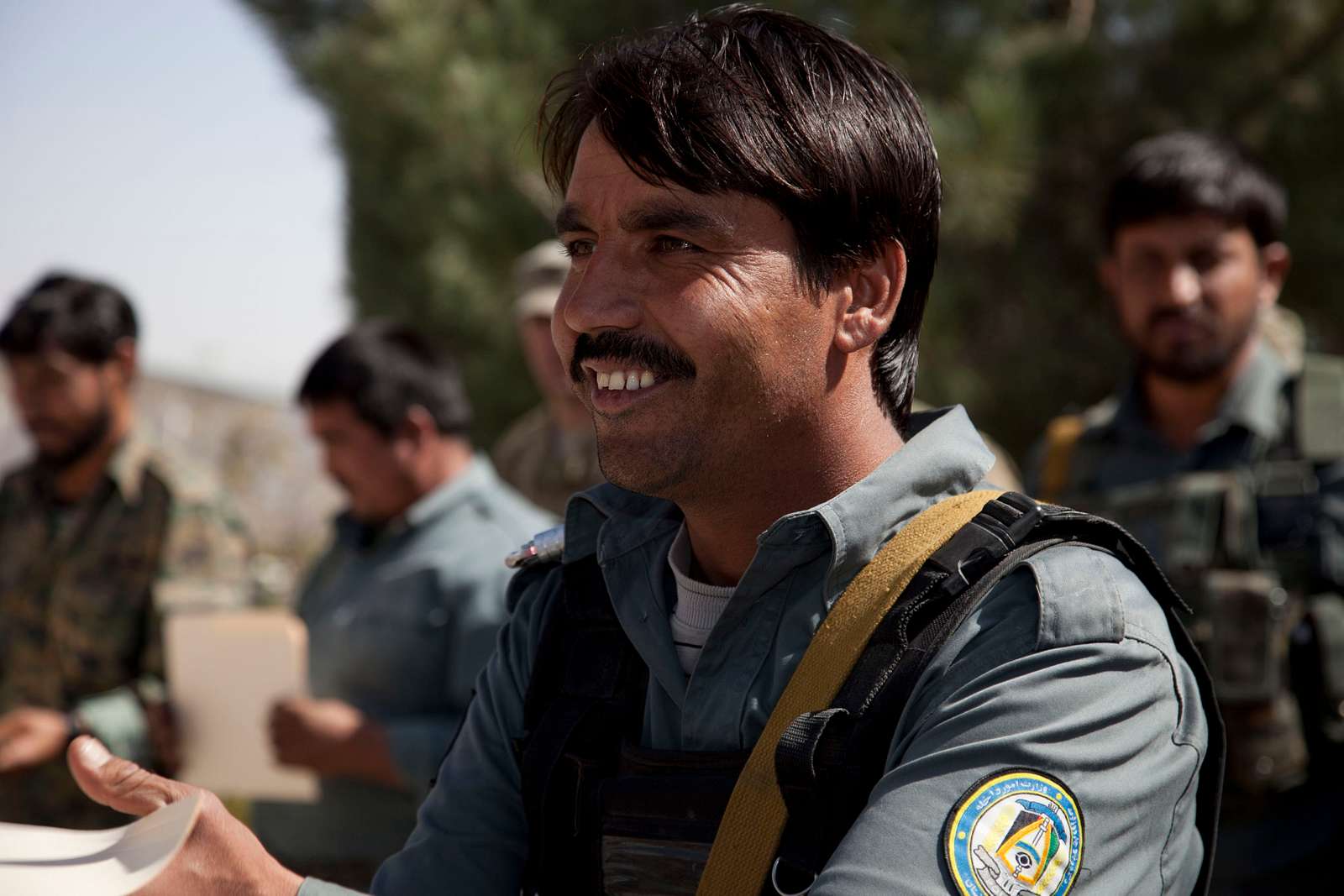 An Afghan national receives his certificate on graduation - NARA ...