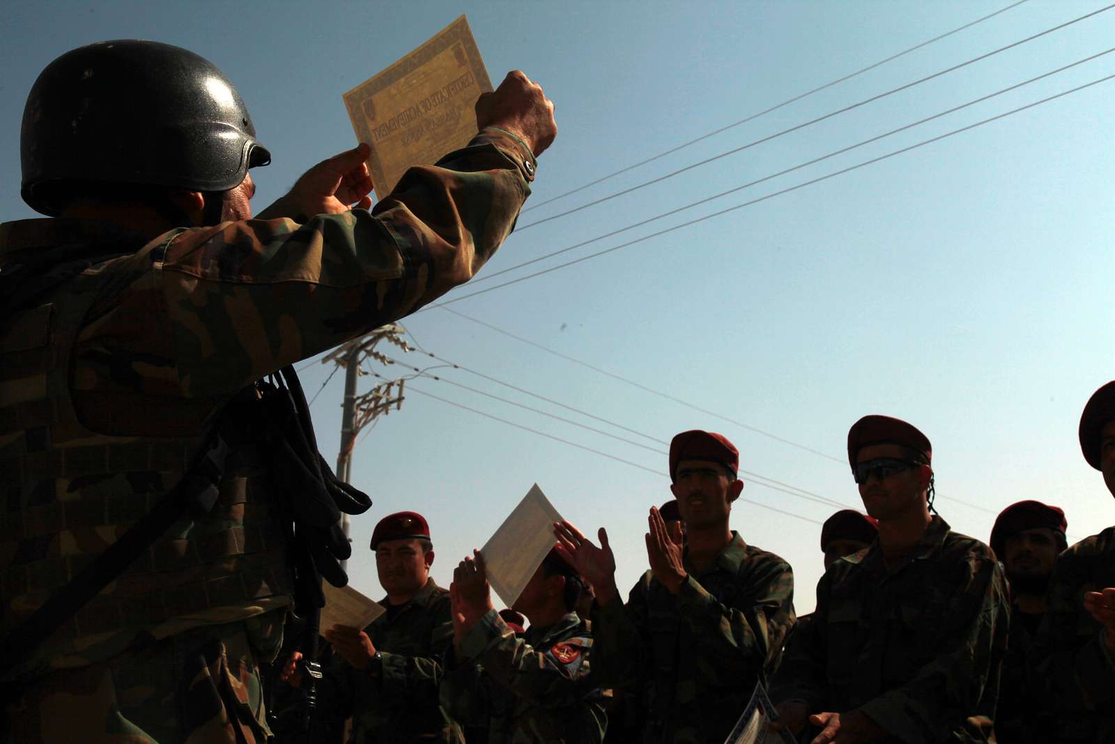 An Afghan National Army Commando Holds Up His Certificate, - NARA ...