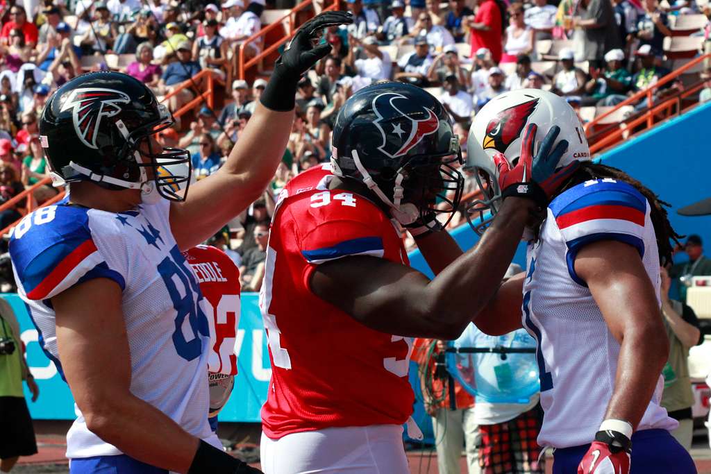 File:Arizona Cardinals wide receiver Larry Fitzgerald, left, and defensive  safety Adrian Wilson share a laugh during the National Football League's  2012 Pro Bowl game at Aloha Stadium in Honolulu Jan. 29, 2012