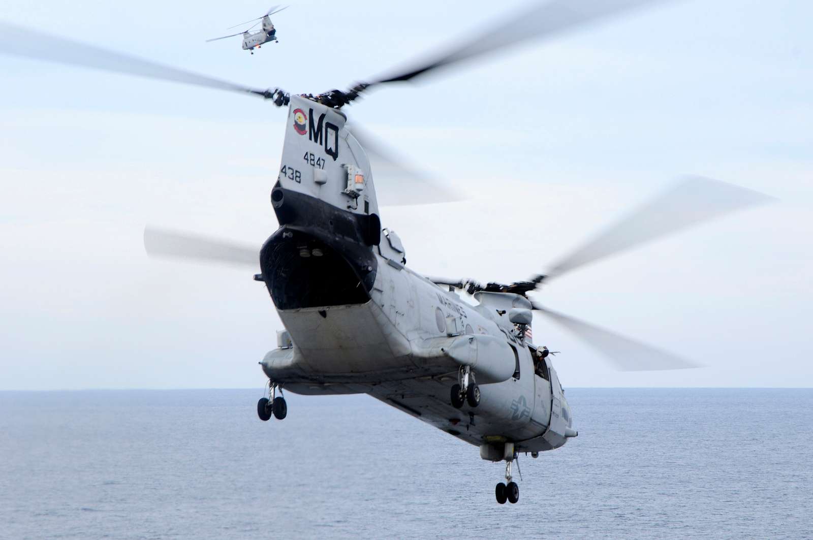 A CH-46 Sea Knight takes off from the flight deck of - NARA & DVIDS ...