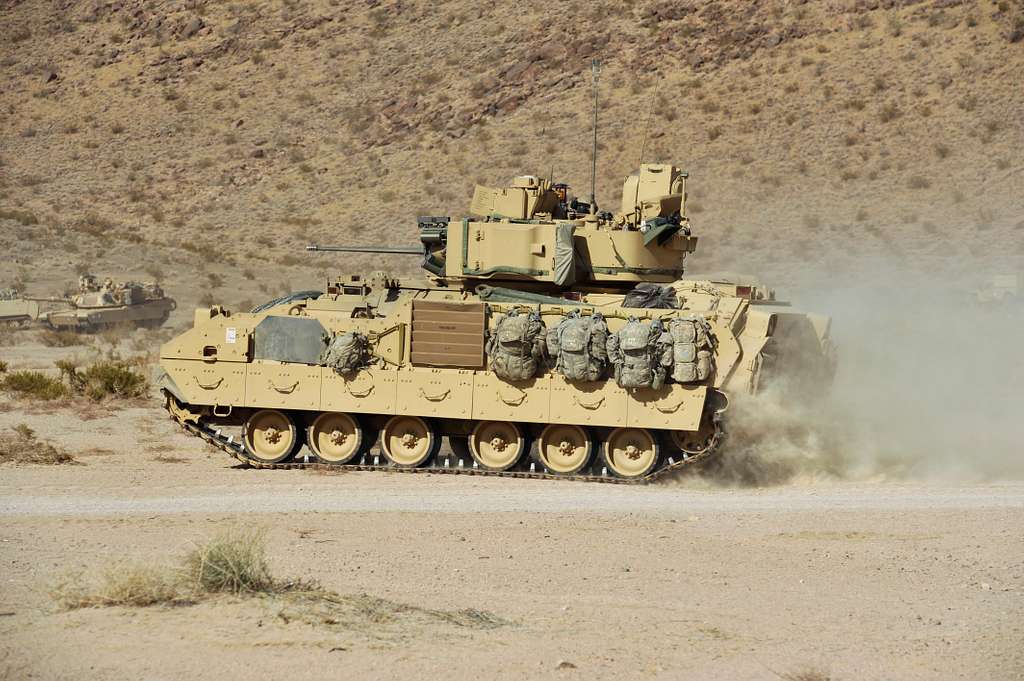 An M2/M3 Bradley Fighting Vehicle moves through the - PICRYL Public ...