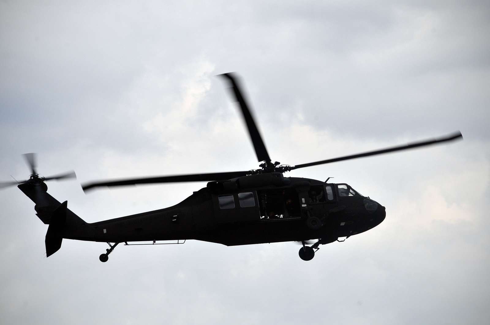 A UH-60 Black Hawk circles overhead before engaging - NARA & DVIDS ...