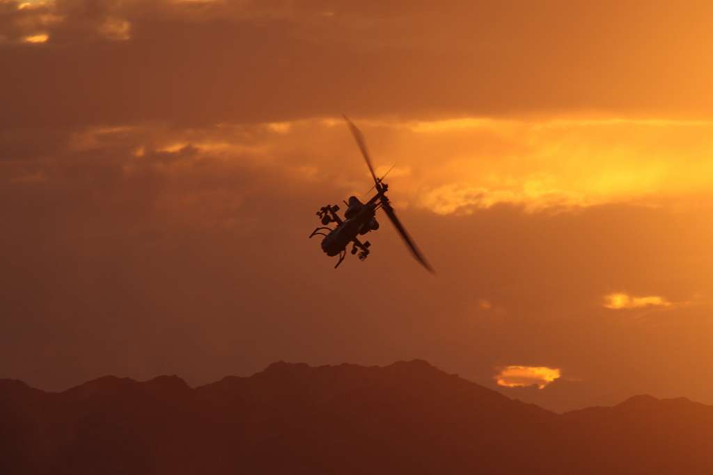 A U.S. Marine Corps AH-1W Super Cobra helicopter engages - PICRYL ...