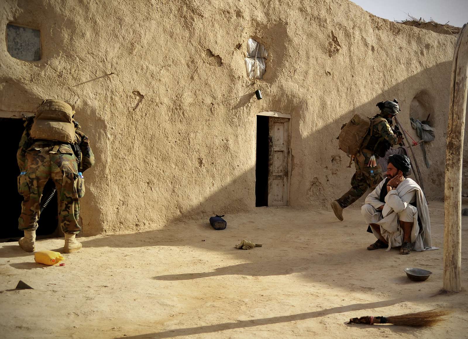 A Village Elder Looks On As Afghan National Army Commandos - NARA ...