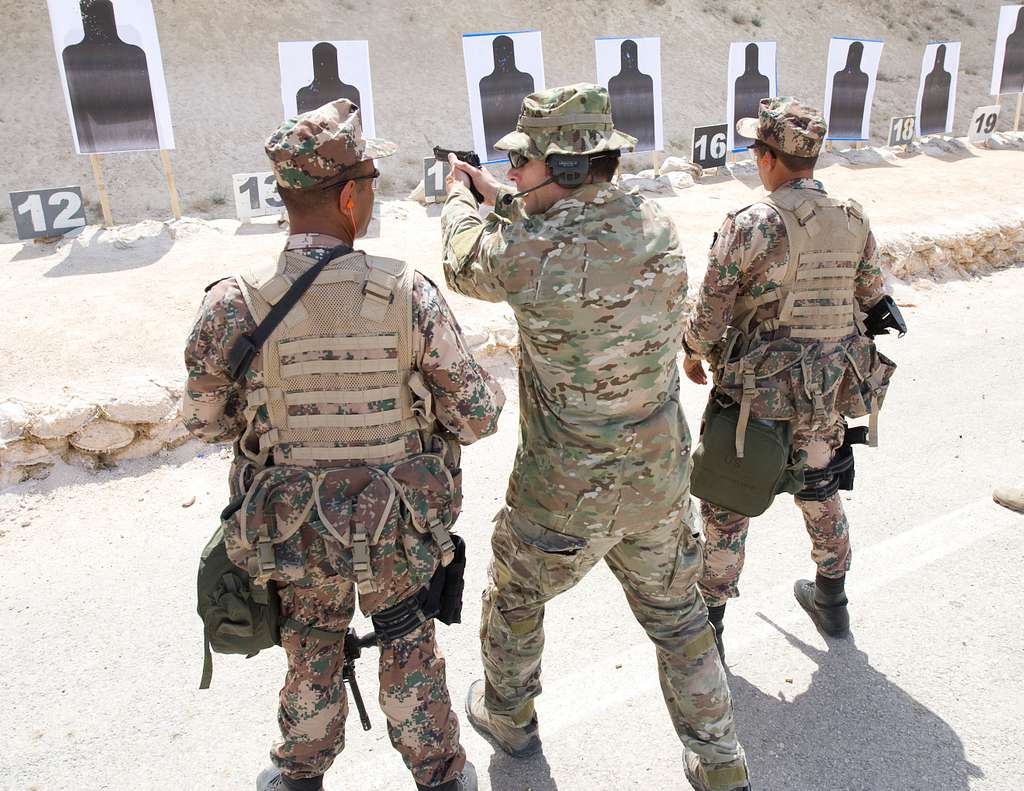 A U.S. military adviser teaches a new shooting technique - NARA & DVIDS ...