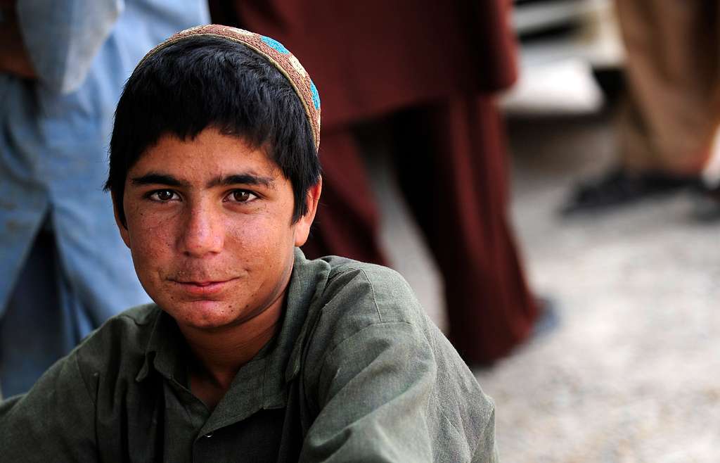 An Afghan male poses for a photograph during a Provincial - NARA ...