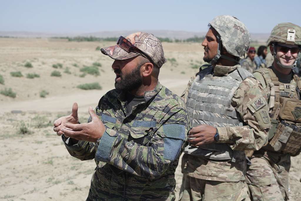 An Afghan National Army commander, left, directs his - NARA & DVIDS ...