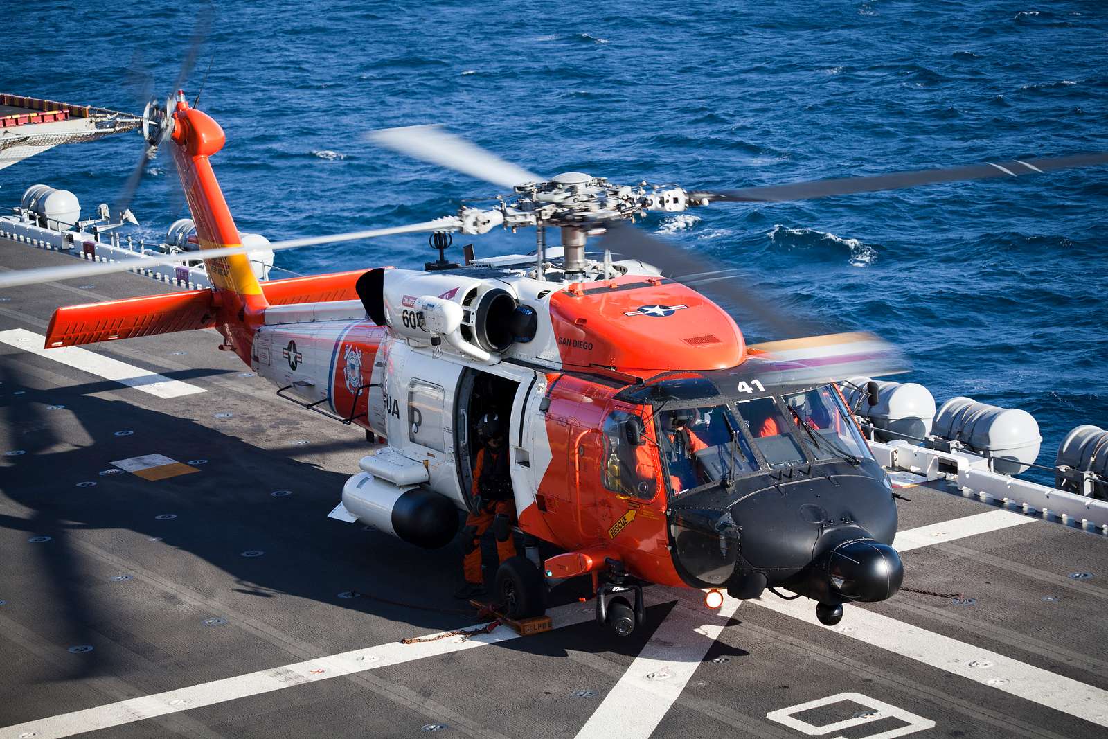 A U.S. Coast Guard HH-60J Jayhawk helicopter is aboard - NARA & DVIDS ...