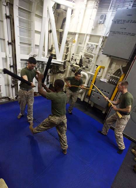 A recruit from Mike Company, 3rd Recruit Training Battalion, applies a choke  hold during a Marine Corps Martial Arts Program test at Marine Corps  Recruit Depot San Diego, July 20. The recruits