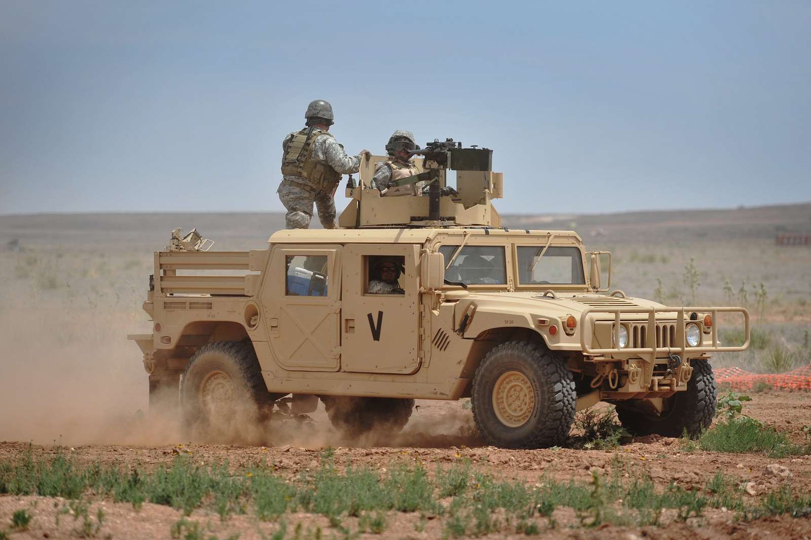 A Humvee navigates through rough terrain during training - NARA & DVIDS ...