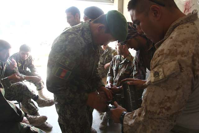 U.S. Marine Corps Sgt. Julio C. Duran, right, with - NARA & DVIDS ...