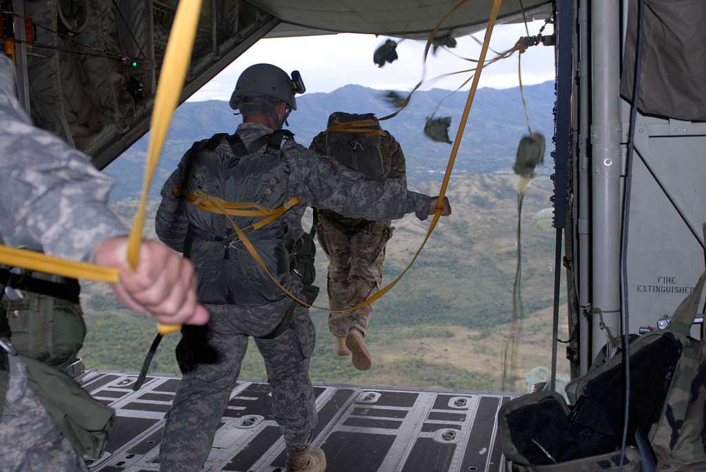 Competitors conduct a static line jump from a C-130 - PICRYL