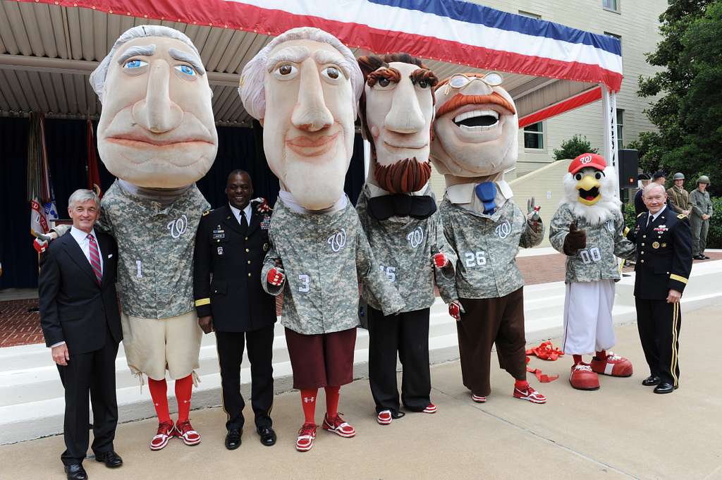 Screech, the Washington Nationals' mascot, offers Chief Navy Career  Counselor Michael Robinson his cover. - PICRYL - Public Domain Media Search  Engine Public Domain Search