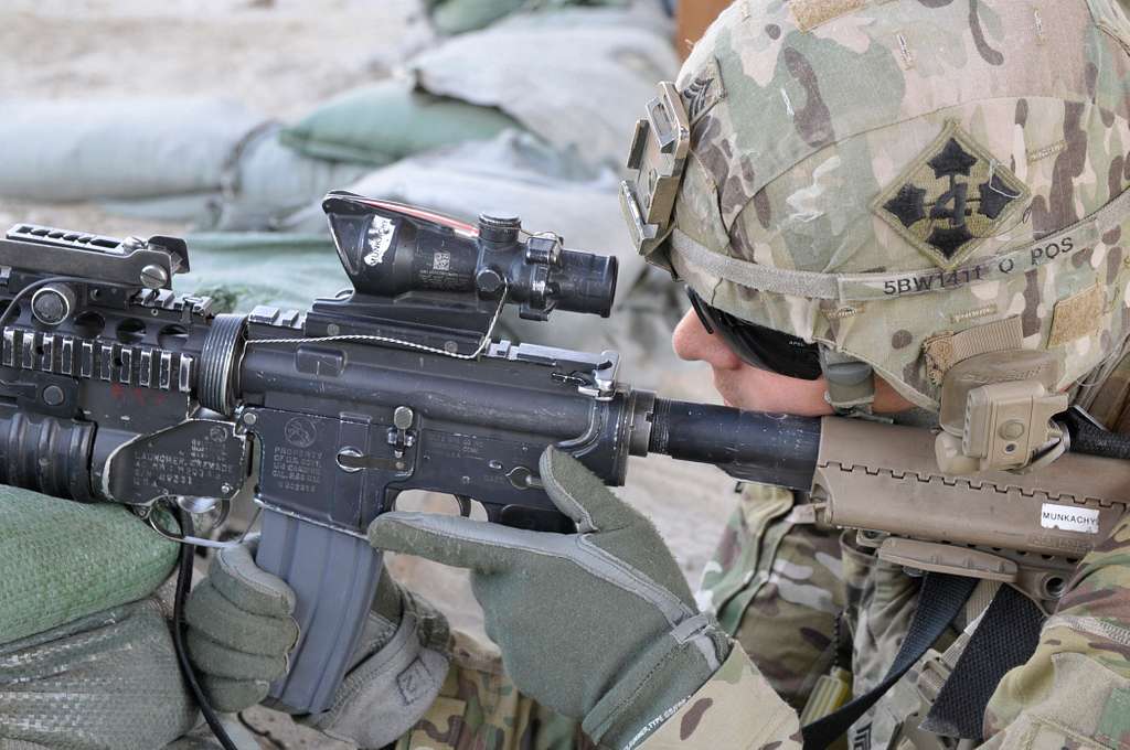 An U.S. Army soldier looks through his sights during - NARA & DVIDS ...