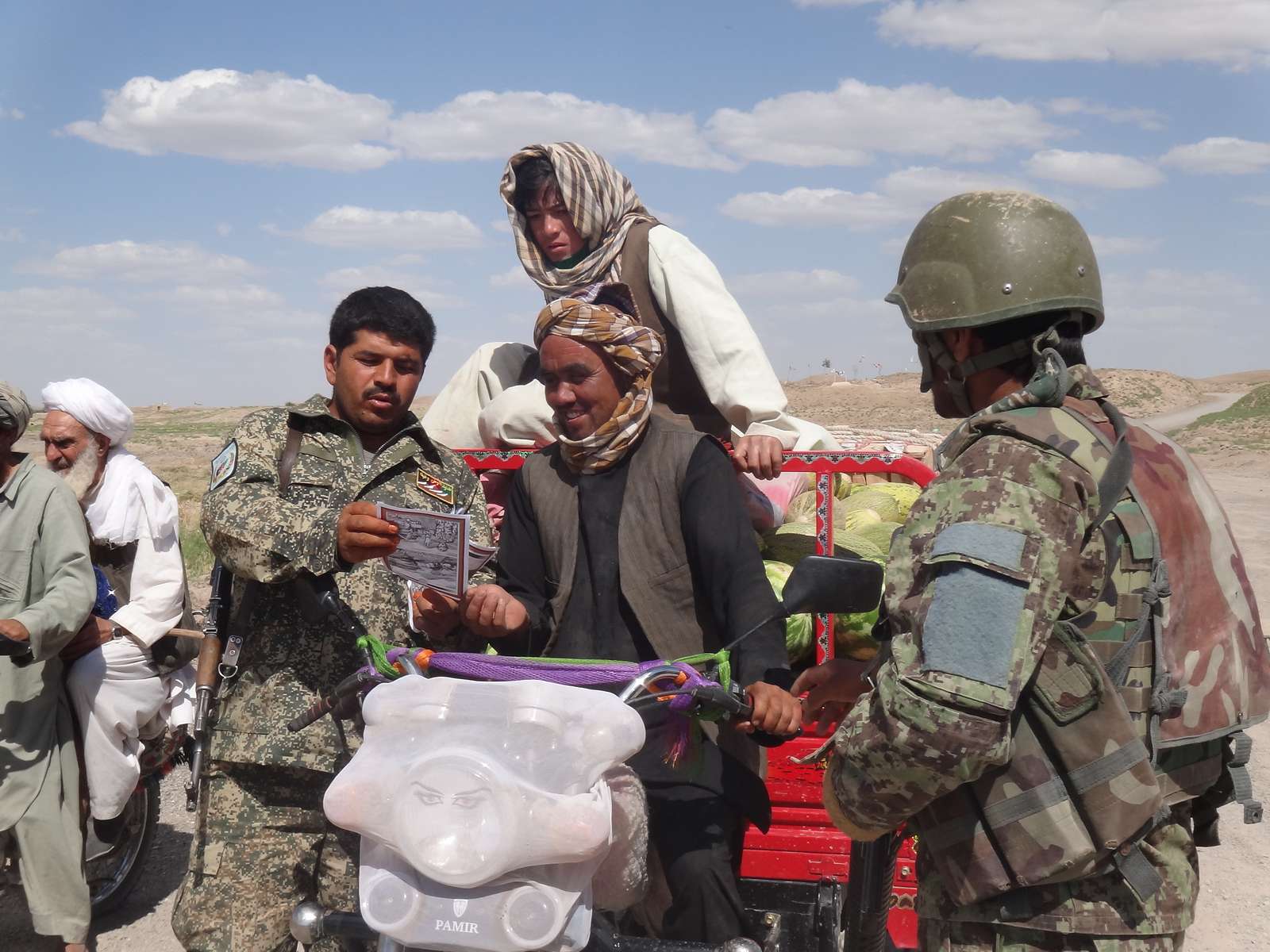 An Afghan National Police Officer and Afghan National - NARA & DVIDS ...