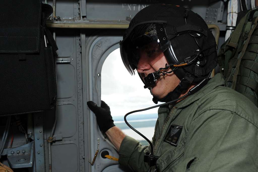 A U.S. Marine of HMX-1 rides in a CH-46 Sea Knight - NARA & DVIDS ...