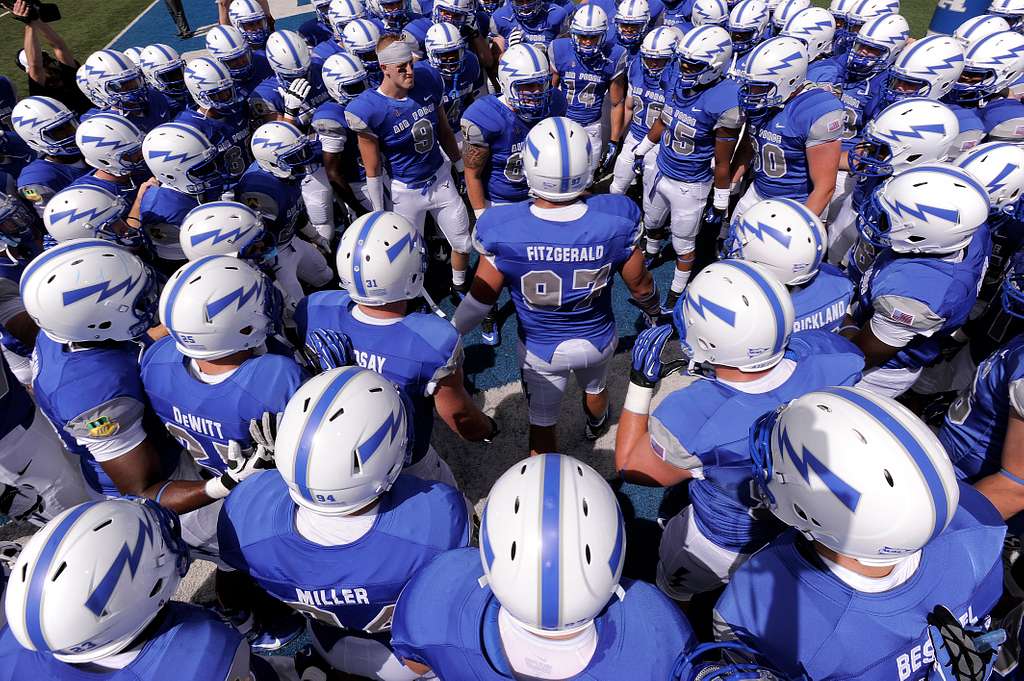 The U.S. Air Force Academy Football Team Huddles Before - NARA & DVIDS ...