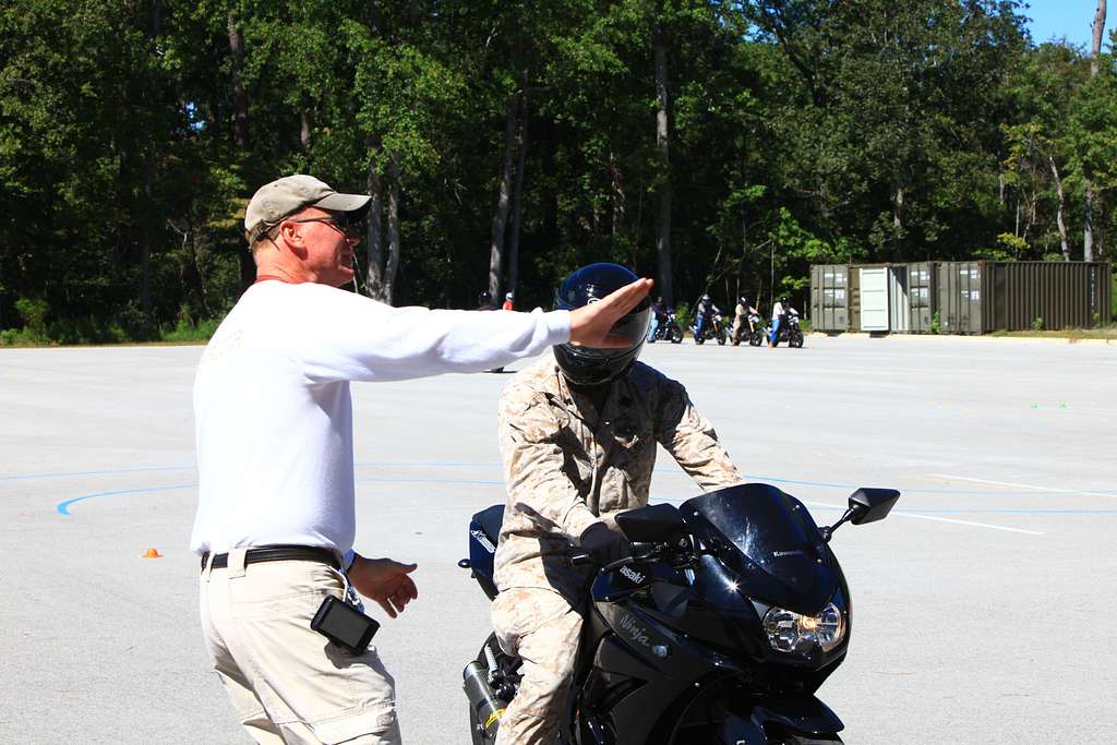 Mike Lacy, a motorcycle ridercoach aboard Camp Lejeune, NARA & DVIDS