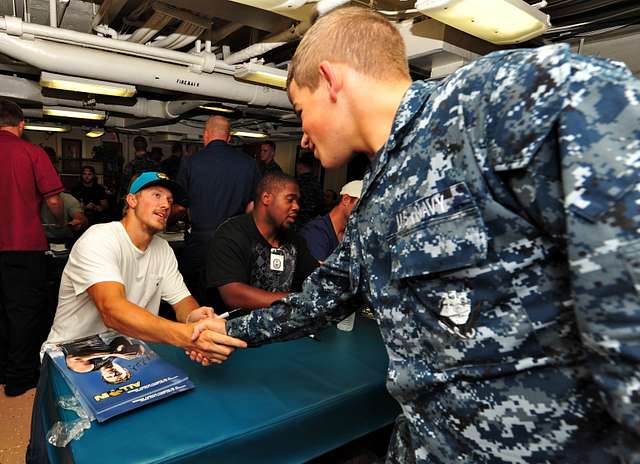 Guy Whimper, Offensive Tackle for the Jacksonville Jaguars, signs sports  memorabilia for Sailors following a Jaguars practice. - PICRYL - Public  Domain Media Search Engine Public Domain Search