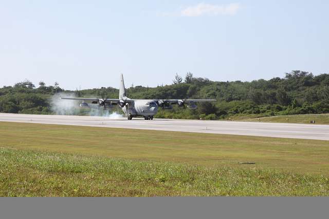 A KC-130J Hercules aircraft lands at Tinian’s West - NARA & DVIDS ...