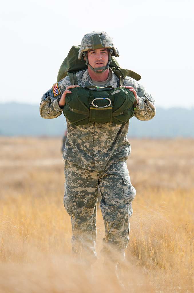 A U.S. Army soldier leaves the drop zone after completing - PICRYL ...