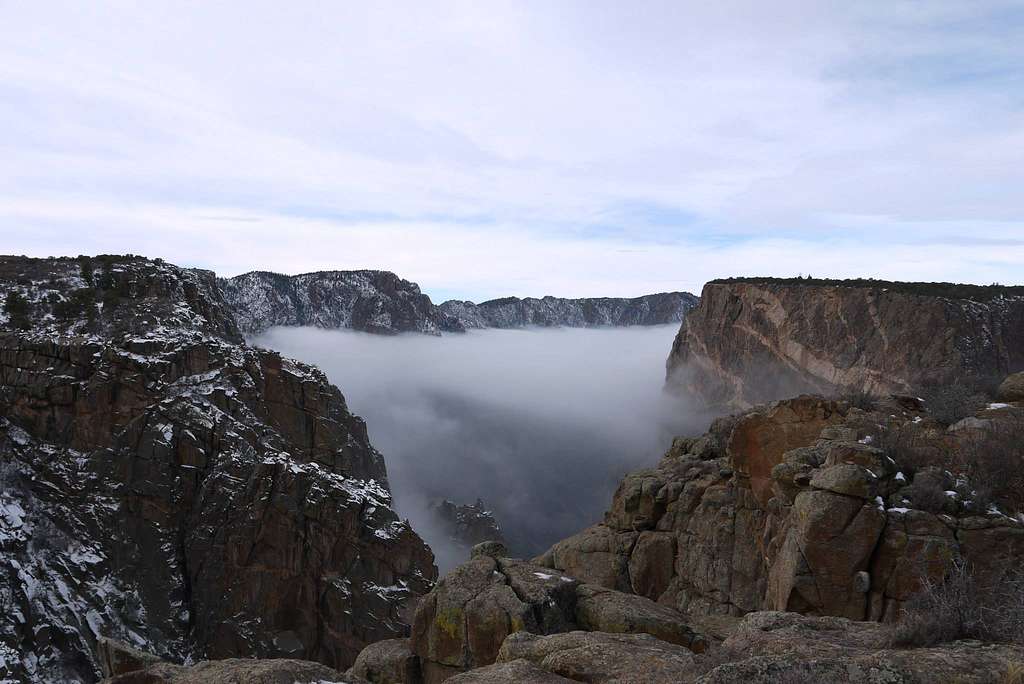 https://cdn2.picryl.com/photo/2013/01/01/inversion-over-painted-wall-black-canyon-of-the-gunnison-national-park-2013-67bd81-1024.jpg