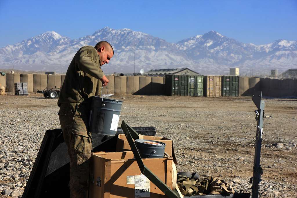 A soldier from the 247th Quartermaster Company, stationed - NARA ...