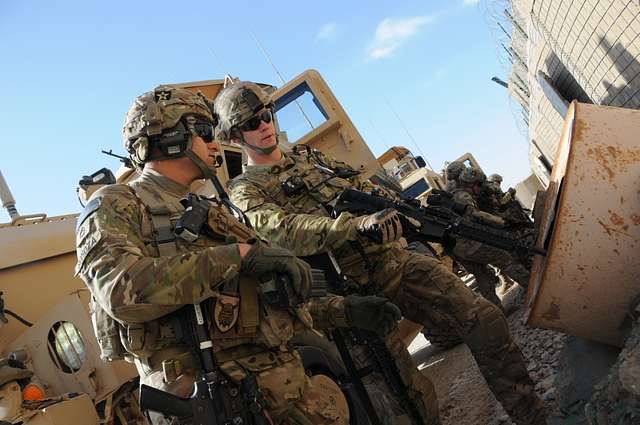 U.S. Army Sgt. 1st Class Sal Somoza, left, security - NARA & DVIDS ...