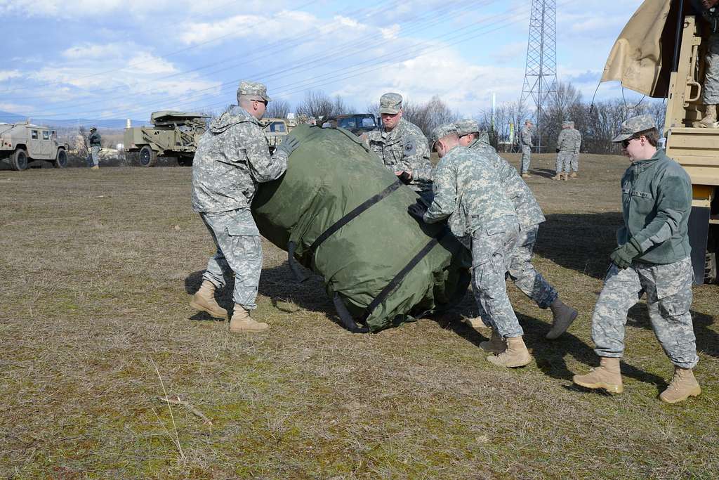 DVIDS - Images - Sgt. 1st Class Billy Crawford secures the tent