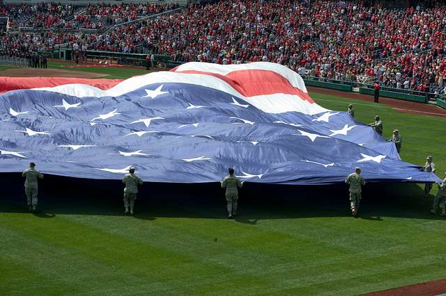 WASHINGTON (May 14, 2019) Screech, the Washington Nationals mascot, shakes  hands with Personnel Specialist 1st Class Angelita Baggoo, Navy Reserve  Sailor of the Year, at Nationals Park in Washington, D.C. - PICRYL 