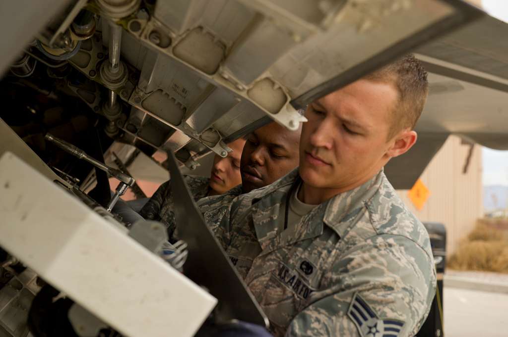 The F-22 Raptor aircraft load-crew loads an inert missile - PICRYL ...