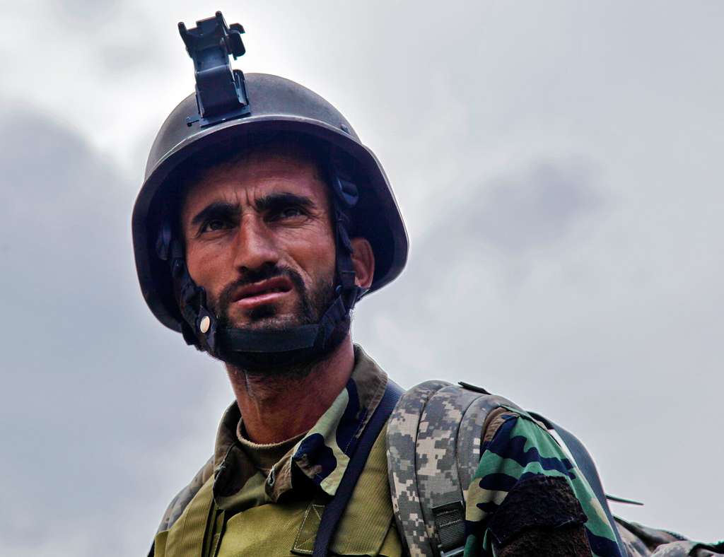 An Afghan soldier scans his sector before entering - NARA & DVIDS ...