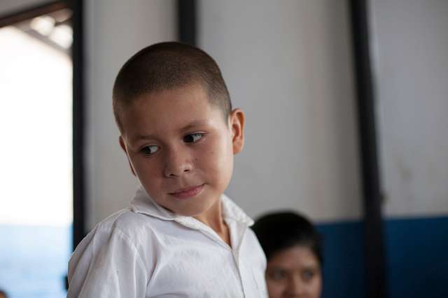 A Salvadoran boy watches as members of the Joint Task - NARA & DVIDS ...