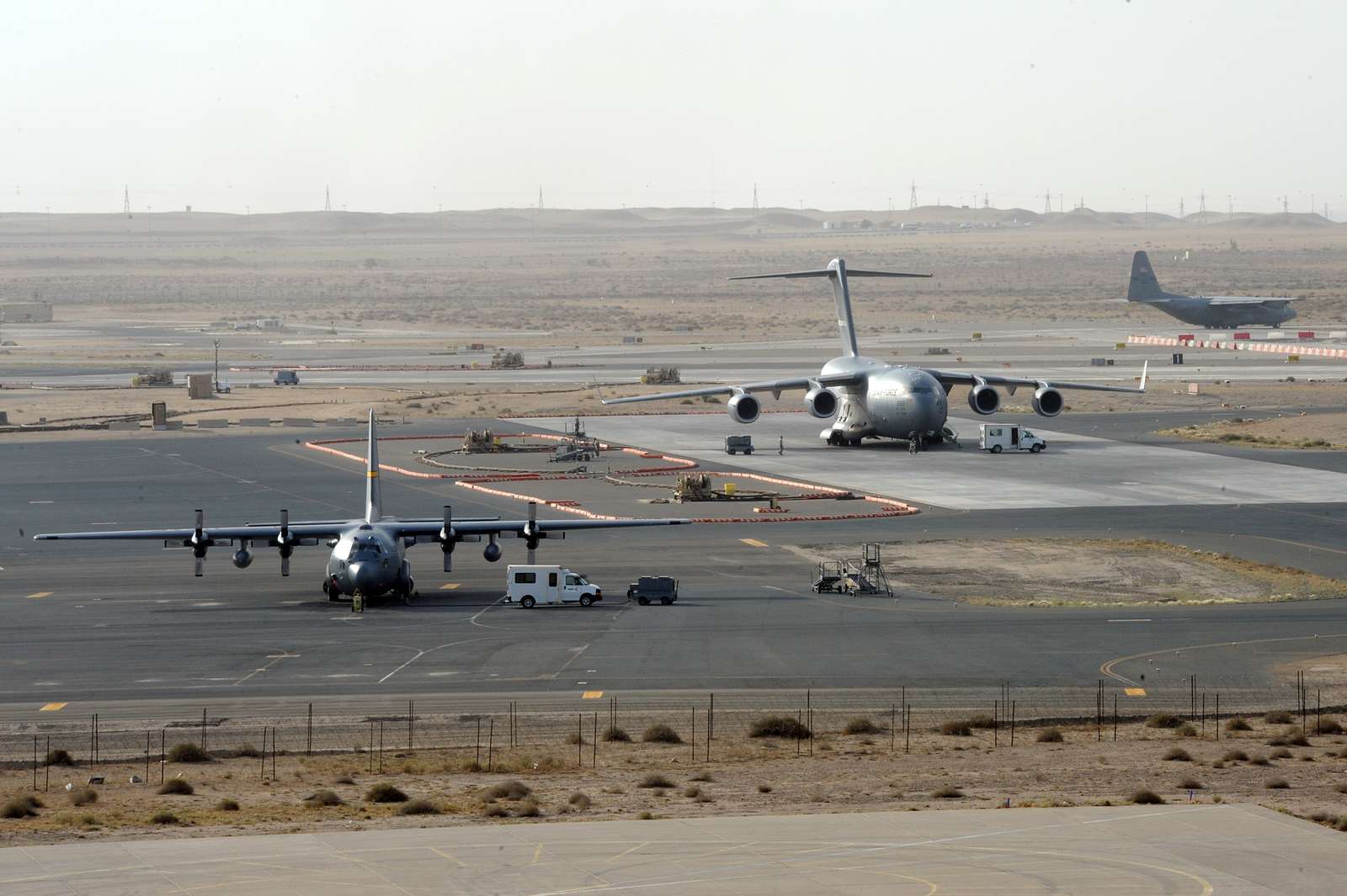 An Air Mobility Command C-130 Hercules deployed from - NARA & DVIDS ...