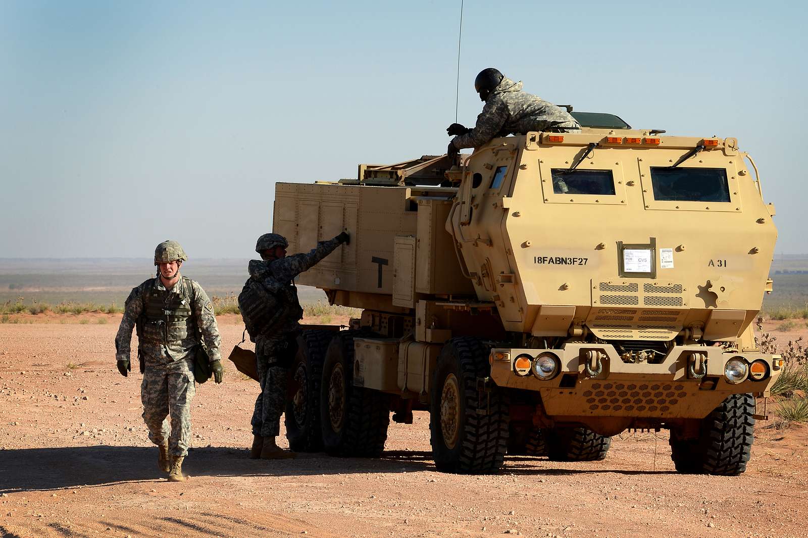 A High Mobility Artillery Rocket System (HIMARS) crew - NARA & DVIDS ...