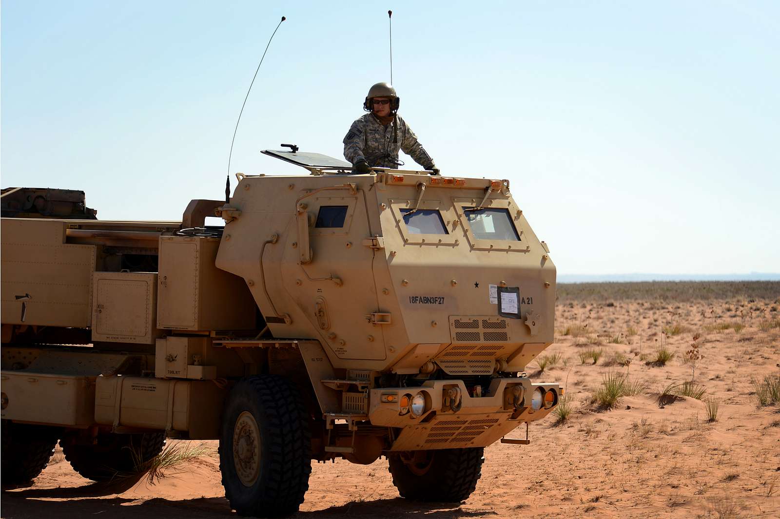 A High Mobility Artillery Rocket System (HIMARS) crew - NARA & DVIDS ...