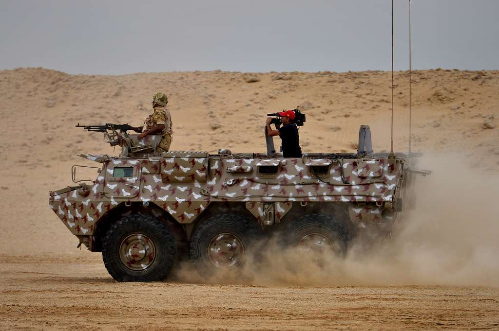 A Qatar Armed Forces armored vehicle leads a unit convoy - PICRYL ...