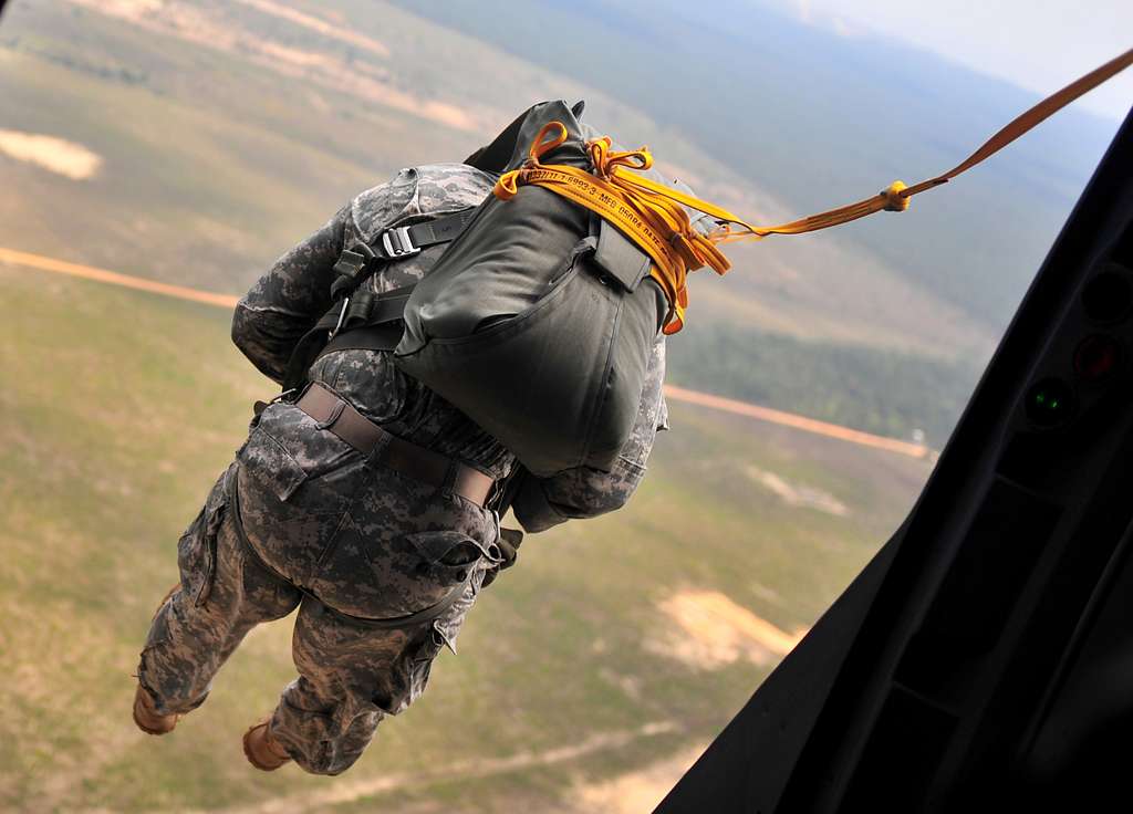 An U.S. soldier conducts a static line jump from an - NARA & DVIDS