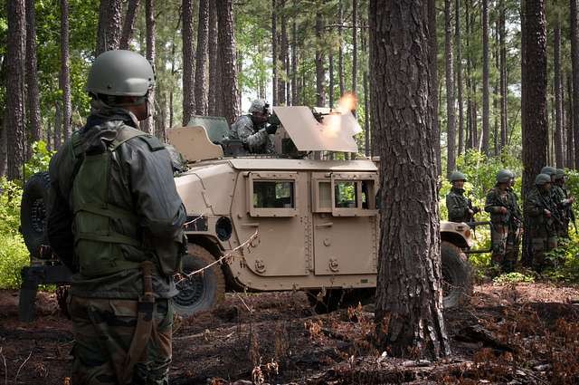 U.S. Army - An Indian Army paratrooper with the 50th Independent Para  Brigade hands his static line to a jumpmaster with the 1st Brigade Combat  Team, 82nd Airborne Division, in a mock