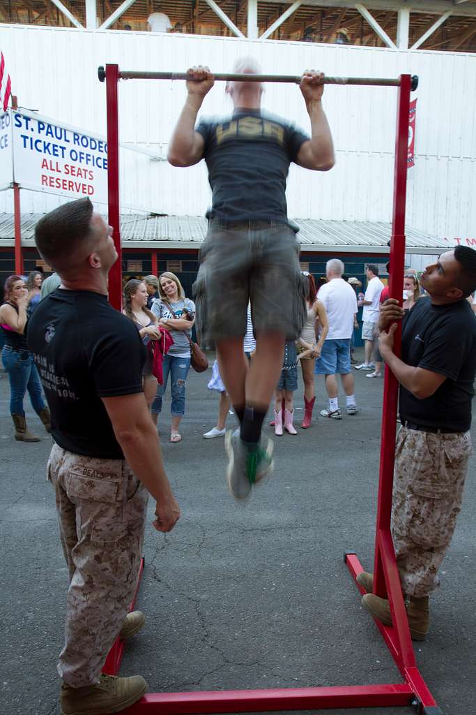 Rodeo attendees attempt pull-ups during a Marine Corps - NARA & DVIDS ...