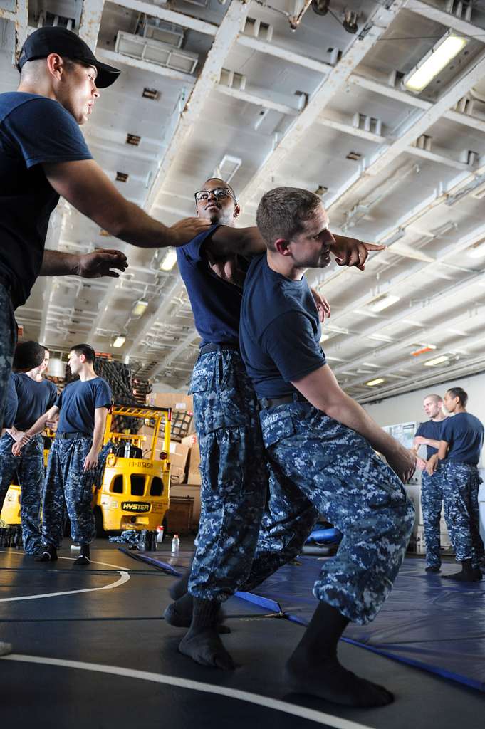 From left, U.S. Navy MasteratArms 2nd Class John PICRYL Public