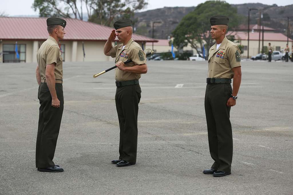 Sgt. Maj. Carlos Ruiz (center), outgoing sergeant major - NARA