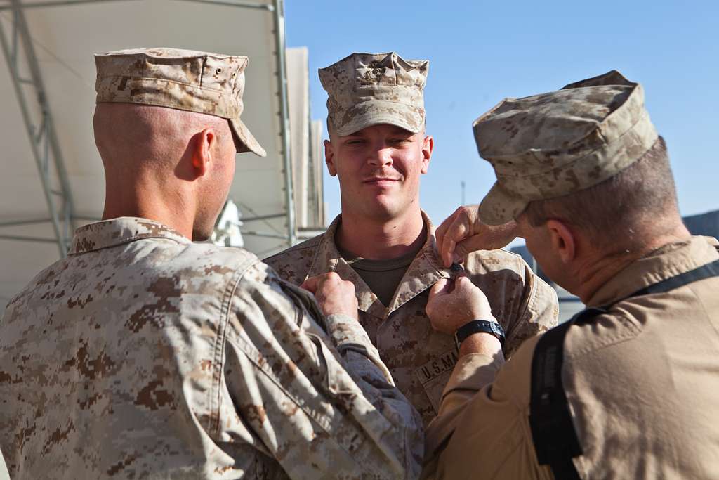 Sgt. Martin A. Witman, center, a combat crewman with - NARA & DVIDS ...