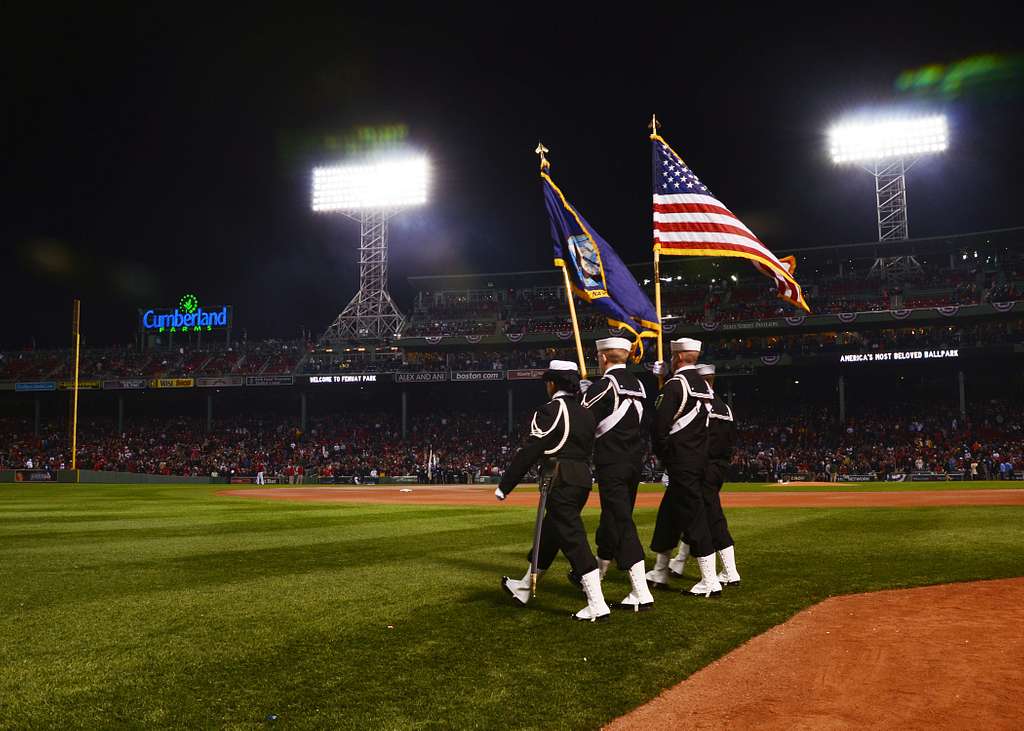 180411-N-SM577-0304 BIRMINGHAM, Ala. (April 11, 2018) Sailors assigned to  USS Constitution post the colors during the national anthem at the opening  day game of the Birmingham Barons baseball team during Navy Week