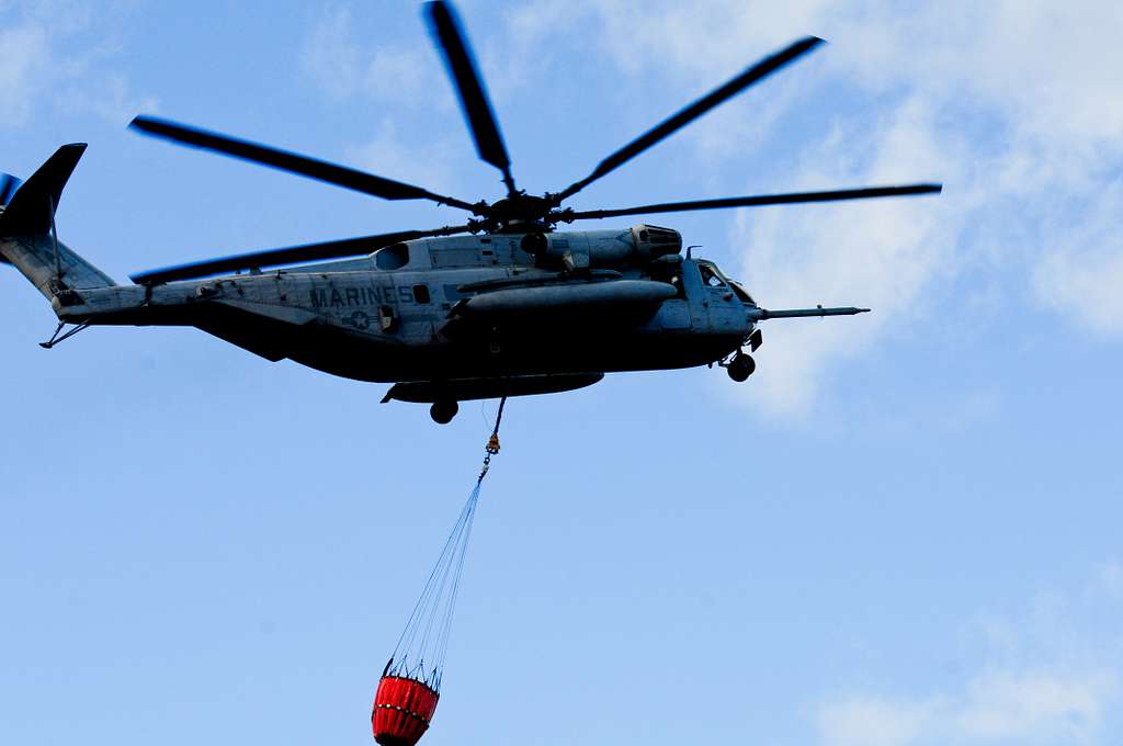 A Marine CH-53 Sea Stallion uses a Bambi Bucket to - PICRYL Public ...