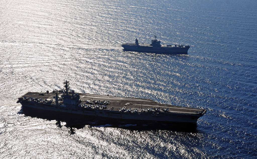 The aircraft carrier USS Nimitz (CVN 68), bottom, is - PICRYL - Public ...