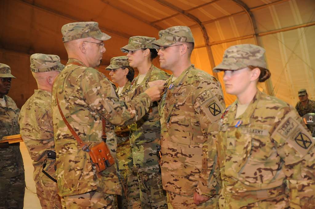 Sgt. Maj. Carlos Ruiz (right), outgoing sergeant major - NARA & DVIDS  Public Domain Archive Public Domain Search